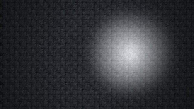 Dark Carbon Fiber Pattern Background with Bright White Glow Spotlight Effect