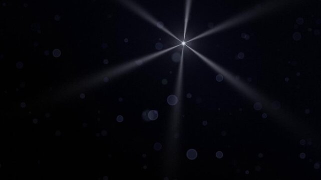 Glowing six-pointed star with soft light rays and floating bokeh