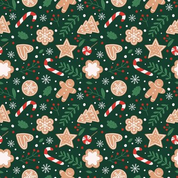 Seamless Christmas pattern with gingerbread cookies, candy canes and snowflakes on dark green background