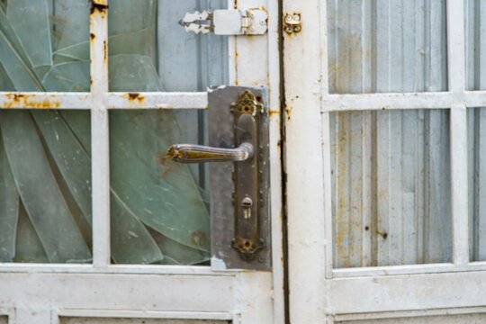 Rusty metal gate and handle in Da Lat Vietnam