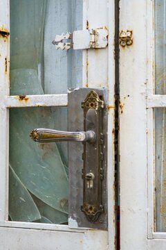 Rusty metal gate and handle in Da Lat Vietnam