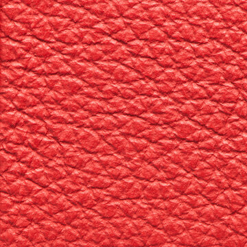 Vibrant red leather texture background with pebble grain pattern