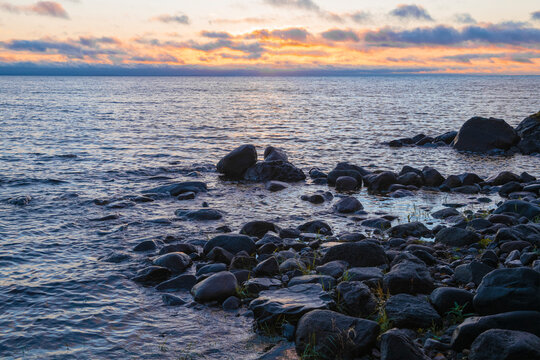 Autumn sunrise on Onega lake. Karelia, Russia