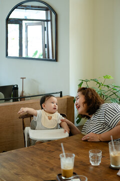 Mother and Baby at Cafe