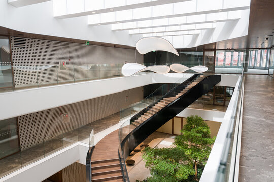 Modern Interior Design With Unique Ceiling Shapes and Plants