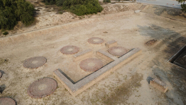 Ancient harappa ruins showing grain threshing and blue dye workshop area pakistan