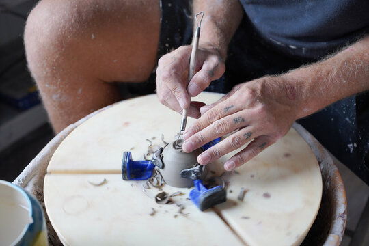 Potter Shaping a Ceramic Bowl