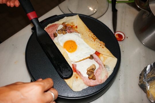 Cooking Breakfast Crepe in Kitchen