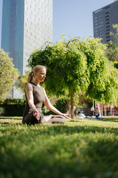 Woman Practicing Yoga in the Park During Her Morning Me Time
