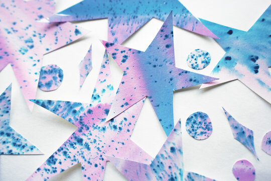 Close-Up of Speckled Purple and Blue Paper Stars
