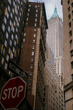 Manhattan Skyscraper Framed by Downtown Buildings