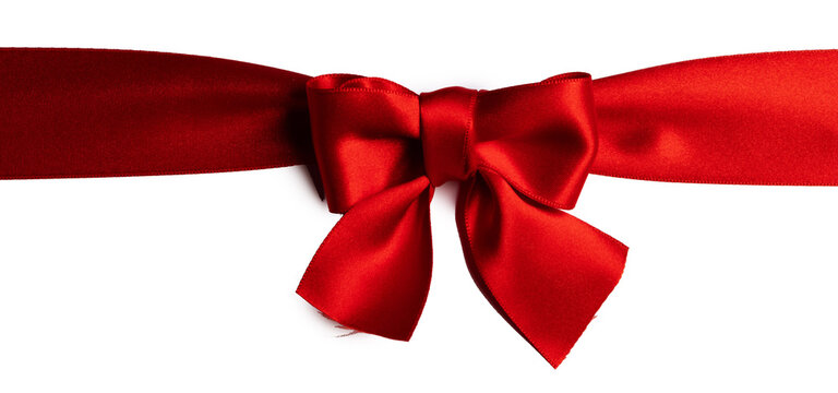 A red ribbon tied in a bow across the page