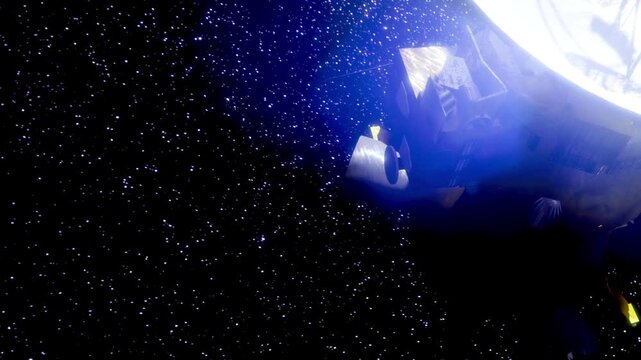 A spacecraft glides through the vast cosmos, surrounded by twinkling stars and cosmic beauty. The engineering marvel captures the wonder of space exploration in its journey.