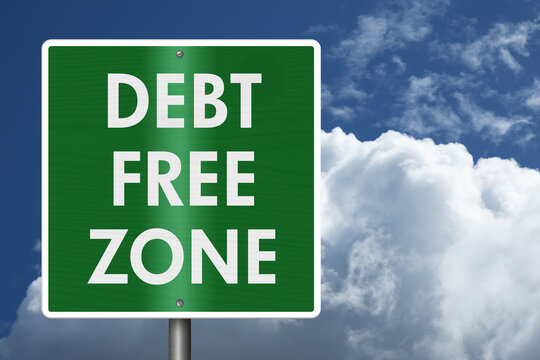 Green Debt free sign with sky