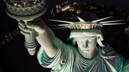 Torch detail on the Statue of Liberty at night © Video80X