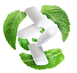 Menthol chewing gum pieces and mint leaves in air against transparent background © New Africa