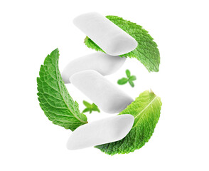 Menthol chewing gum pieces and mint leaves in air against transparent background © New Africa