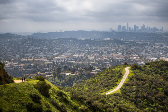 Hiking trails outside of Los Angeles California with DTLA in the distance during a cloudy spring morning