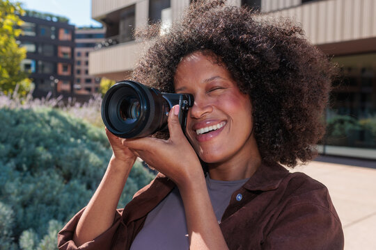 Creative hobby and photography, woman taking pictures with camera