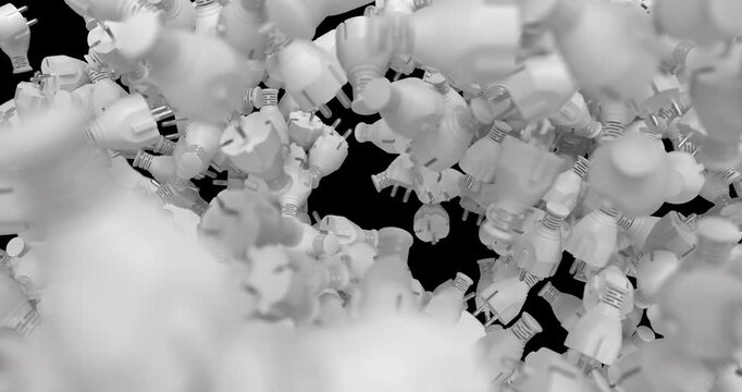 White 3D electric power plugs fall and pile up in a dynamic animation. 4K resolution with alpha channel, ideal for electricity, energy, technology, motion graphics and creative video projects.