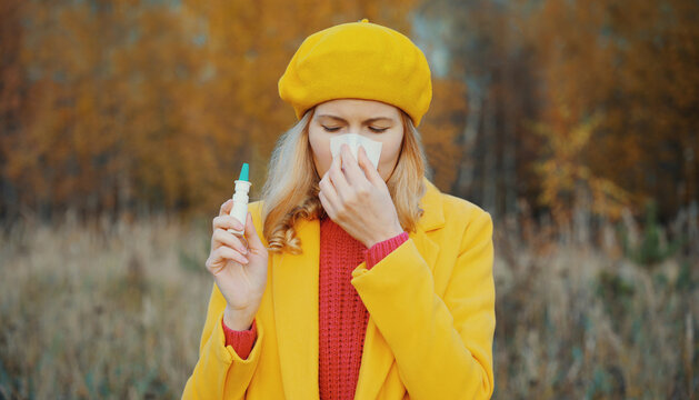 Sick woman sneezing blow nose using tissue, unhealthy suffering girl feels unwell