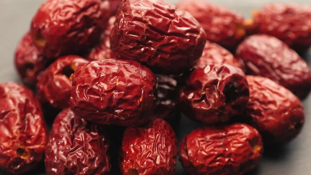 Red date and dried chili pepper, chinese jujube dried dates and hot red chili for sichuan hot pot soup, asian spicy ingredient and dried fruit close up