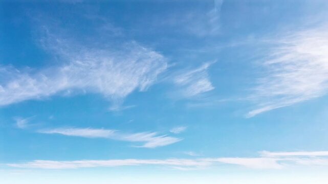 Clear blue sky with wispy cirrus clouds in daytime