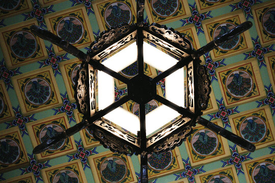 Hexagonal lantern under a painted Chinese coffered ceiling, Chinese Garden Zurich, Switzerland
