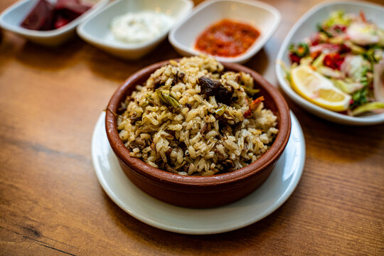Close up of traditional Beypazari guvec with rice and meat.
