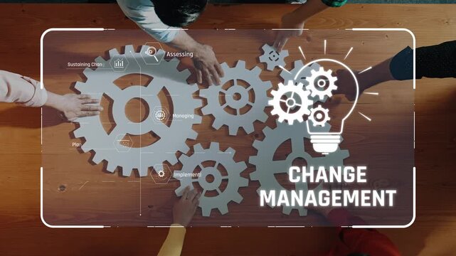 This image captures a dynamic teamwork session focused on change management, featuring gears and a light bulb icon that symbolize innovation and strategic planning. Raster