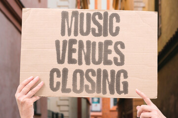 "Music venues closing" Small stages vanish across cities. VENUES. MUSIC. CLOSURES. GIGS. BANDS. © AndriiKoval