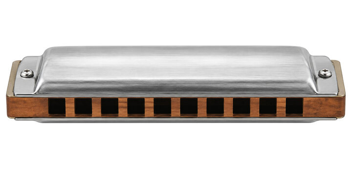A sleek silver harmonica with a wooden comb isolated against a clean white background studio shot
