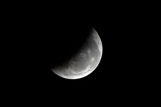 A close-up shot capturing the stunning partial lunar eclipse during the night of August 27 to 28, 2026, as seen from the southern hemisphere in Brazil. 