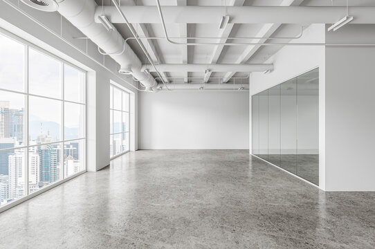 Empty office interior with exposed ducts, polished floor and city windows, realistic style, on bright neutral background, conveying space. 3D Rendering