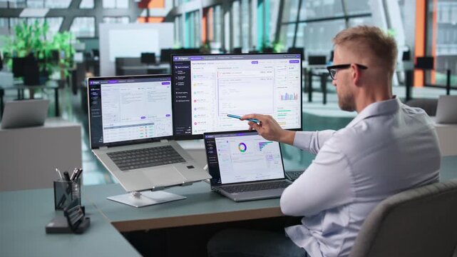 Software Engineer Working On AI Application Using Laptop