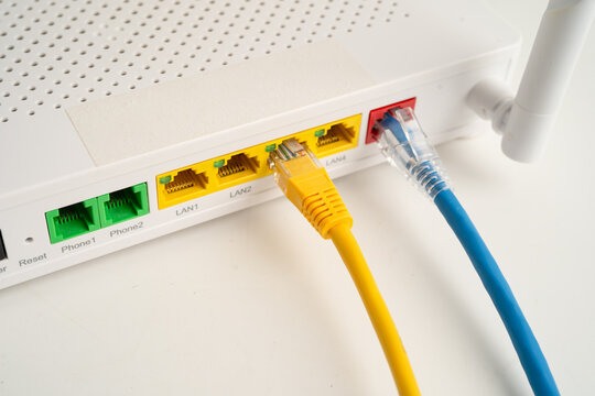 Ethernet cable with wireless router connect to internet service provider network.