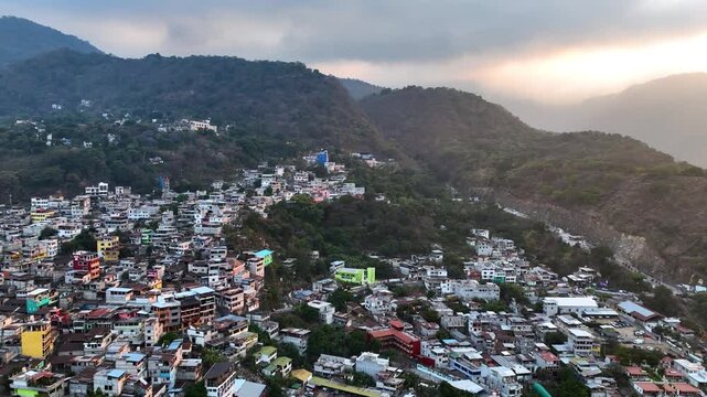 golden hour drone shot of village on Lake Atitlan, Guatemala