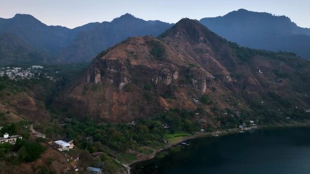 dronw shot of the mountains and hills surrounding lake atitlan in Guatemala