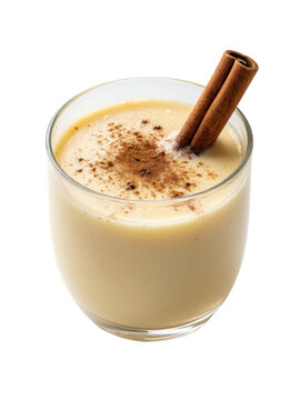 Glass of eggnog with cinnamon stick and nutmeg, isolated on transparent background