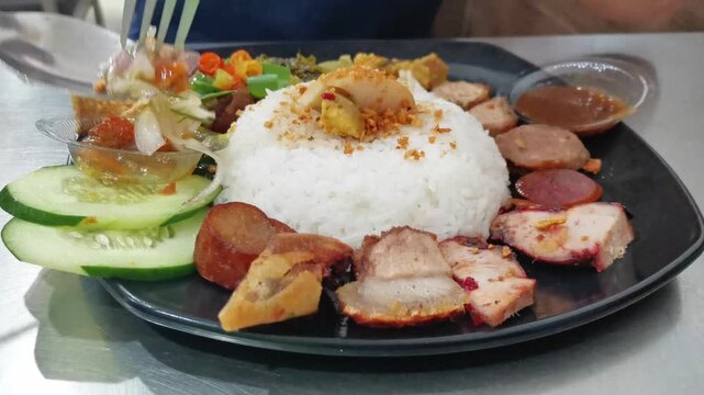 Indonesian Nasi Campur Babi Roast Pork Rice Plate with Sambal