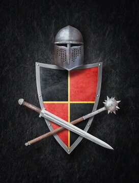sword helmet shield and mace on black grunge background