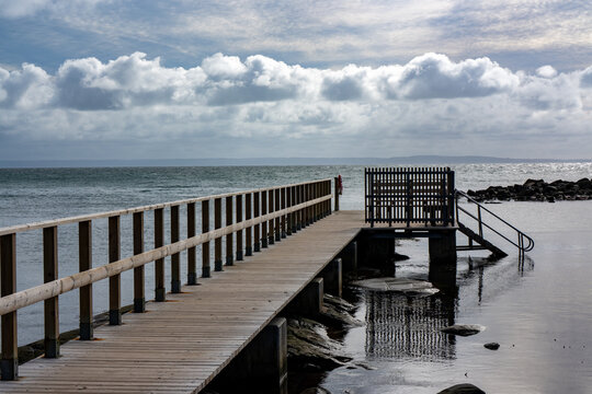 Wooden jetty for swimming in the ocean