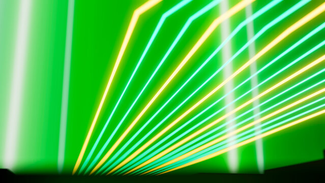 Abstract green background with neon yellow and blue light beams