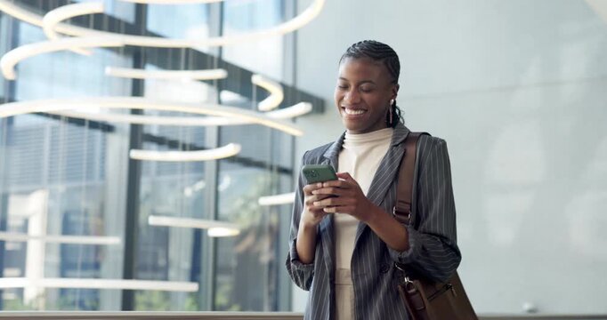 Woman, walk and laugh in office with phone, send funny text message and online meme for work chat. Happy, black person and typing in business with tech, social media joke and app for internet humor.