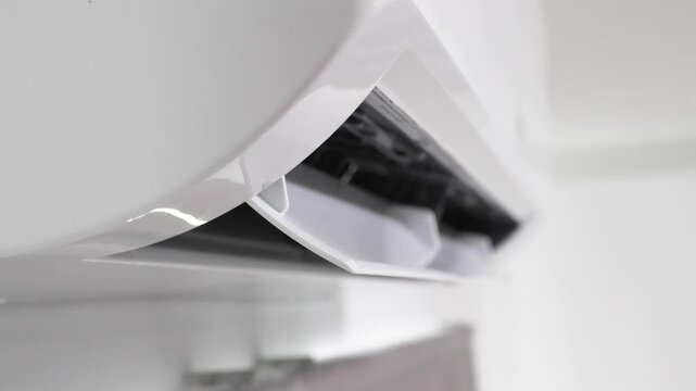 Close up air conditioner on white wall background
