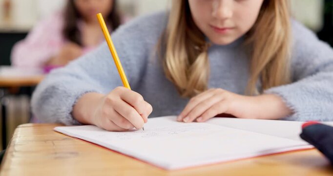 Hands, notebook and learning with child in classroom for education, assignment and study project. Elementary school, lesson and assessment with kid on campus for knowledge, academy and curriculum