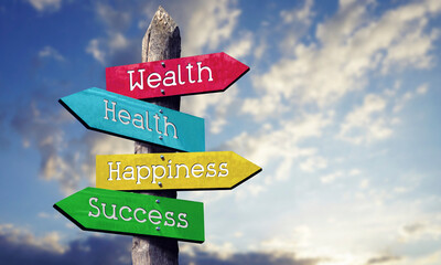 Wealth, health, happiness, success - wooden signpost with four arrows, sky with clouds © PX Media