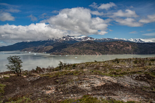Scenic view of torres del paine national park with snow-capped mountains and blue lake in patagonia