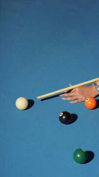 pool table with cue and ball