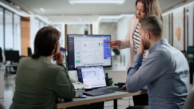 Insurance Underwriter Reviews Policy Data On Laptop